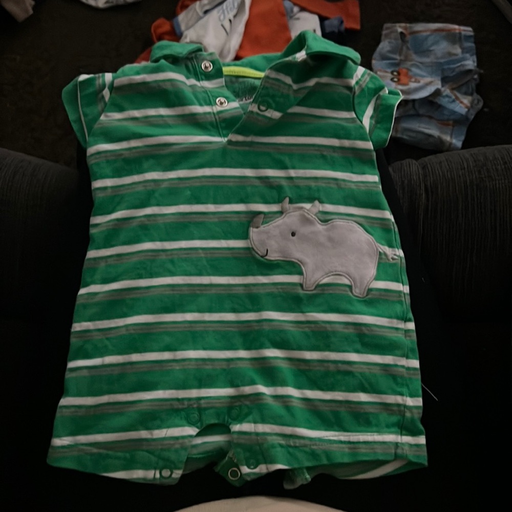 Green and white striped Romber. Rhino 0-8 months